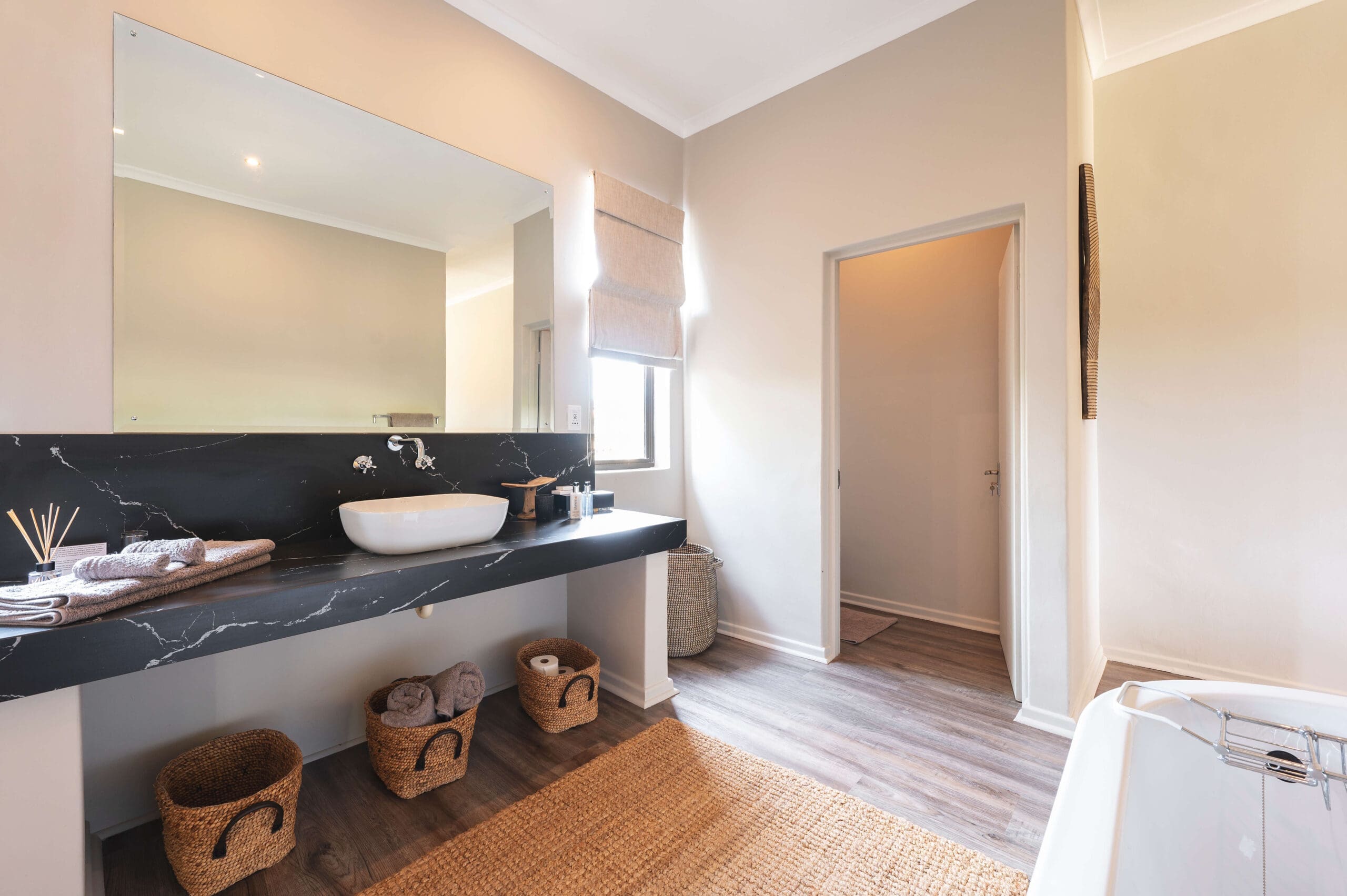Private en-suite bathroom with amenities at Ubuninzi Hunting Safaris.