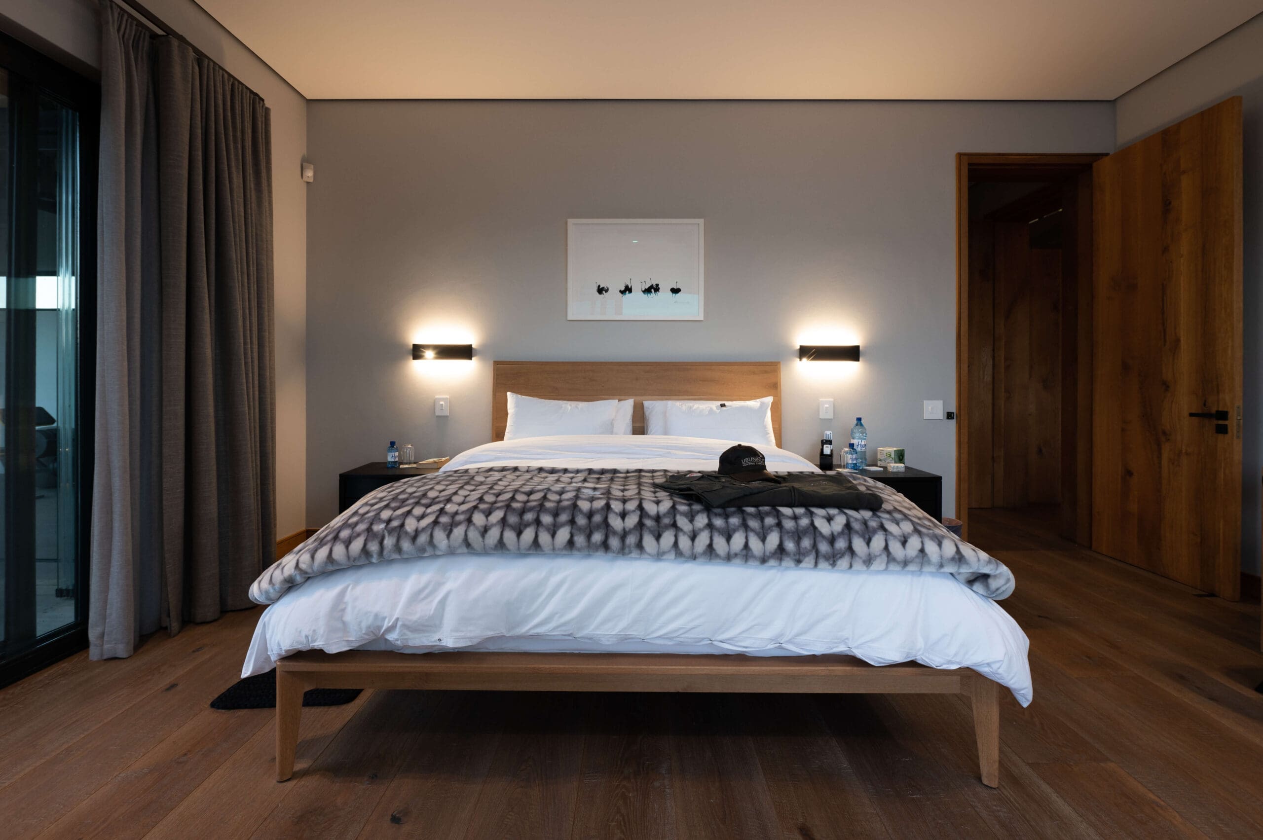 Guest suite with a balcony overlooking the African savanna at Ubuninzi.